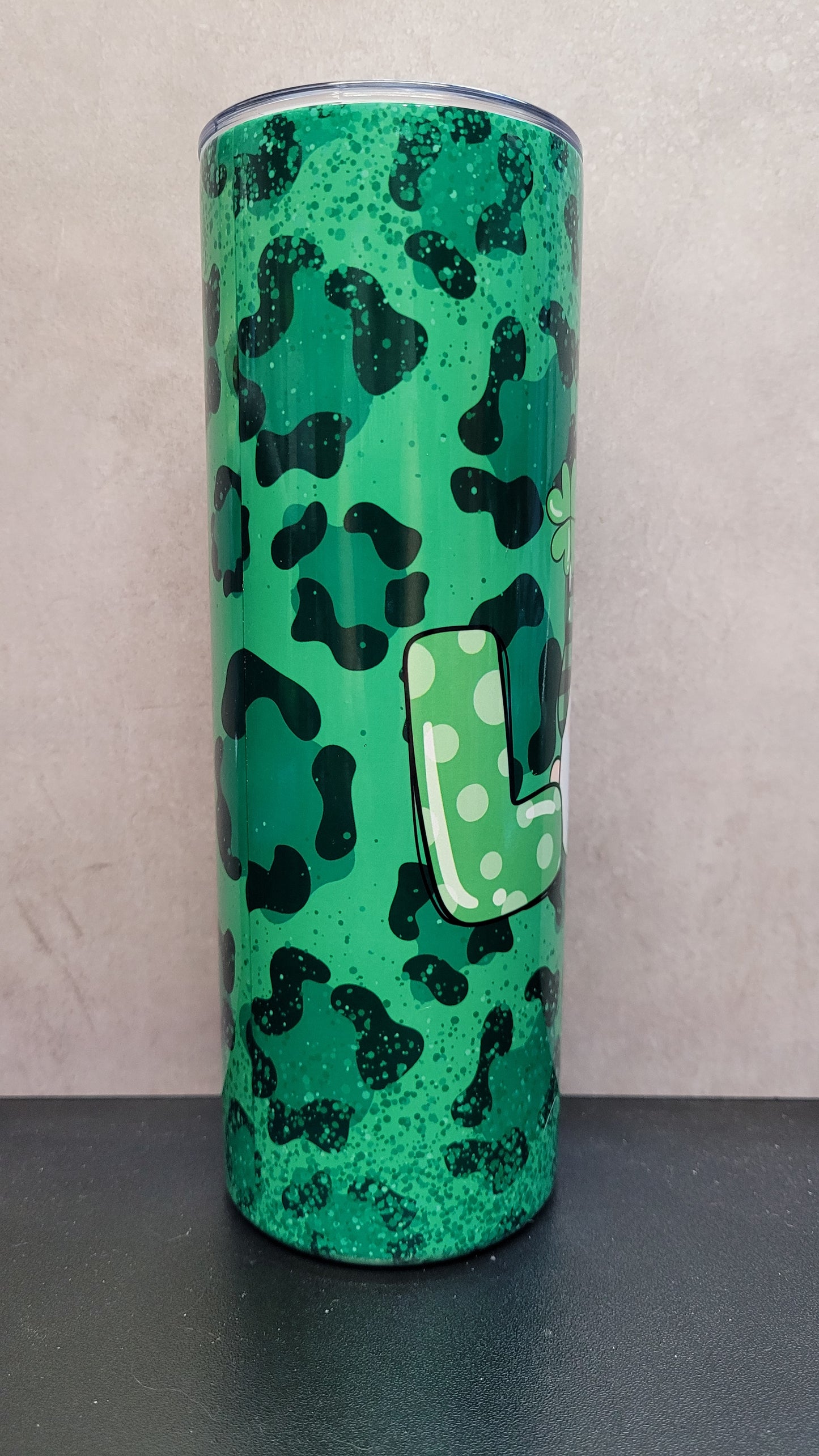 This 20 oz tumbler features a charming Love Gnome design on a stylish green cheetah print background.