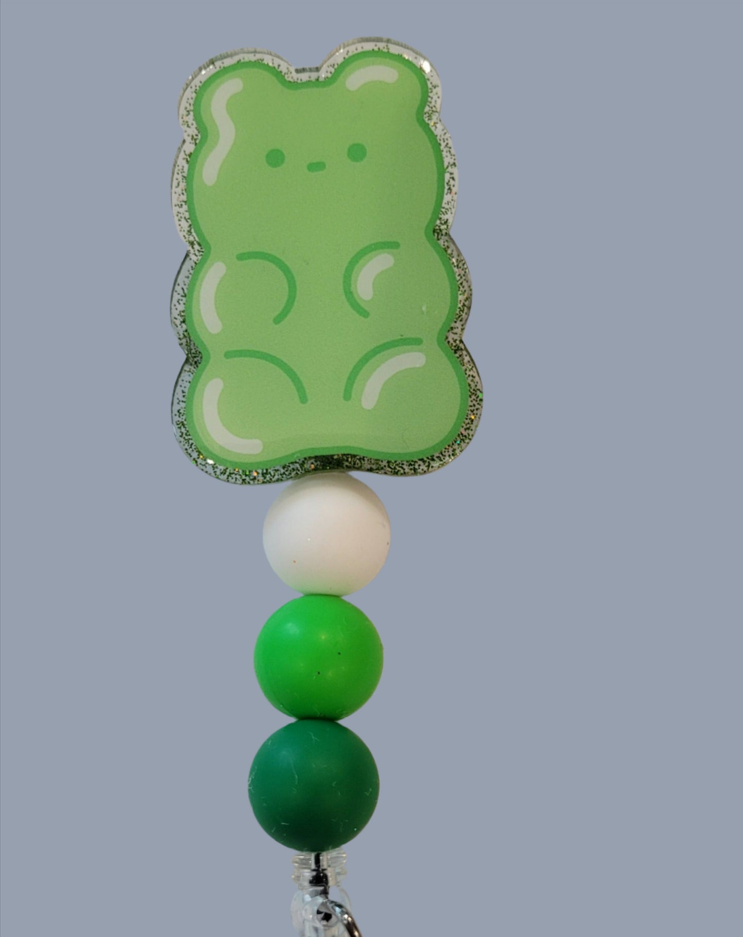 As a Gummy Bear in a Gummy World, these irresistible Badge Reels will have you craving for more! Pick from a range of vibrant colors and silicone accent beads for a truly tasty look!