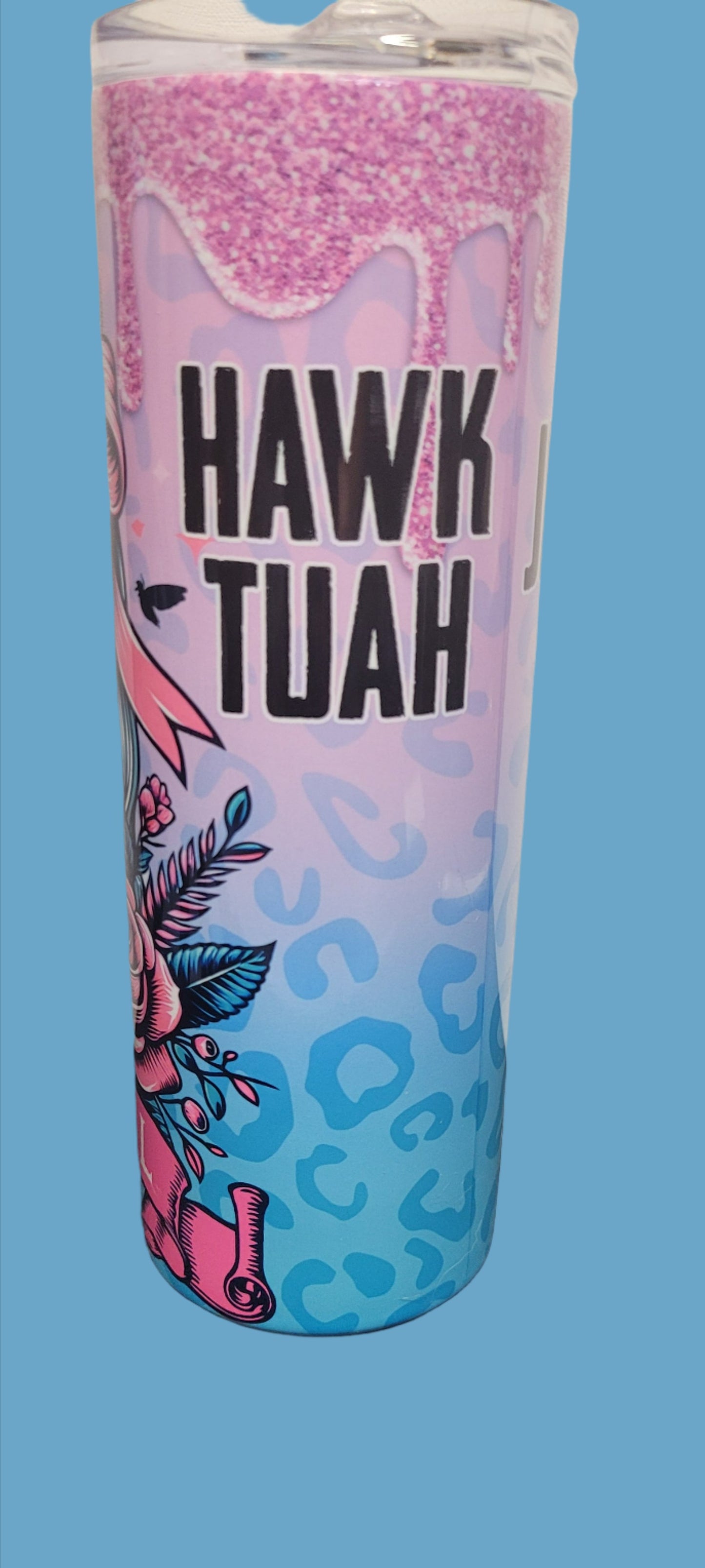 Just A Hawk Tuak Kinda Girl. Featuring a wine sipping skeleton gal surrounded by pink roses and a glitter drip. This 20 oz tumbler from Makerflo is made of a stainless steel double-wall construction and is vacuum insulated, with a clear sliding classic lid and a clear straw, and is BPA free. It is capable of retaining cold temperatures for 24+ hours or warm temperatures for up to 8 hours.