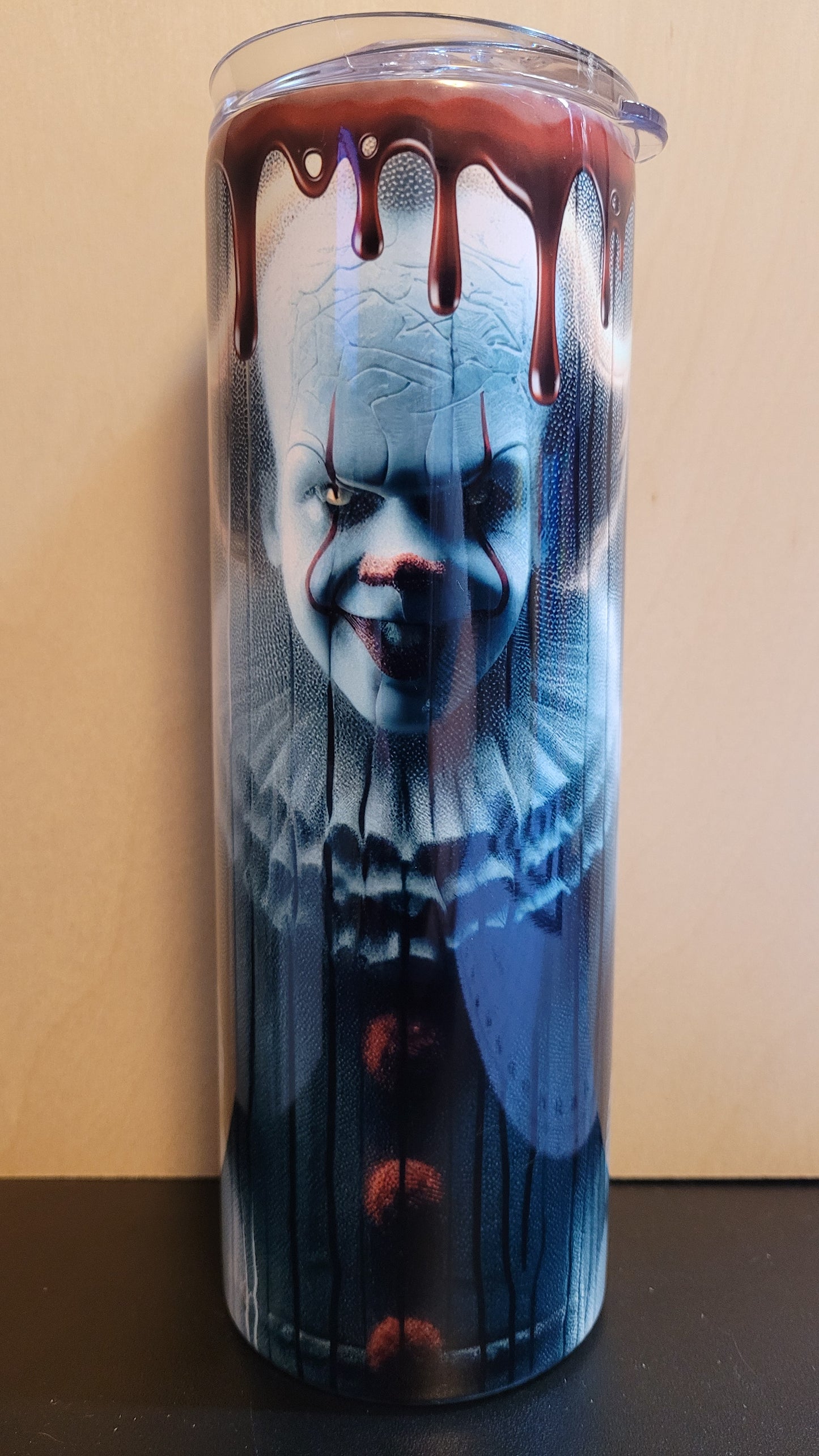 Our horror series sees a new addition.... Pennywise staring at you through a window in the rain....blood dripping down from the top...