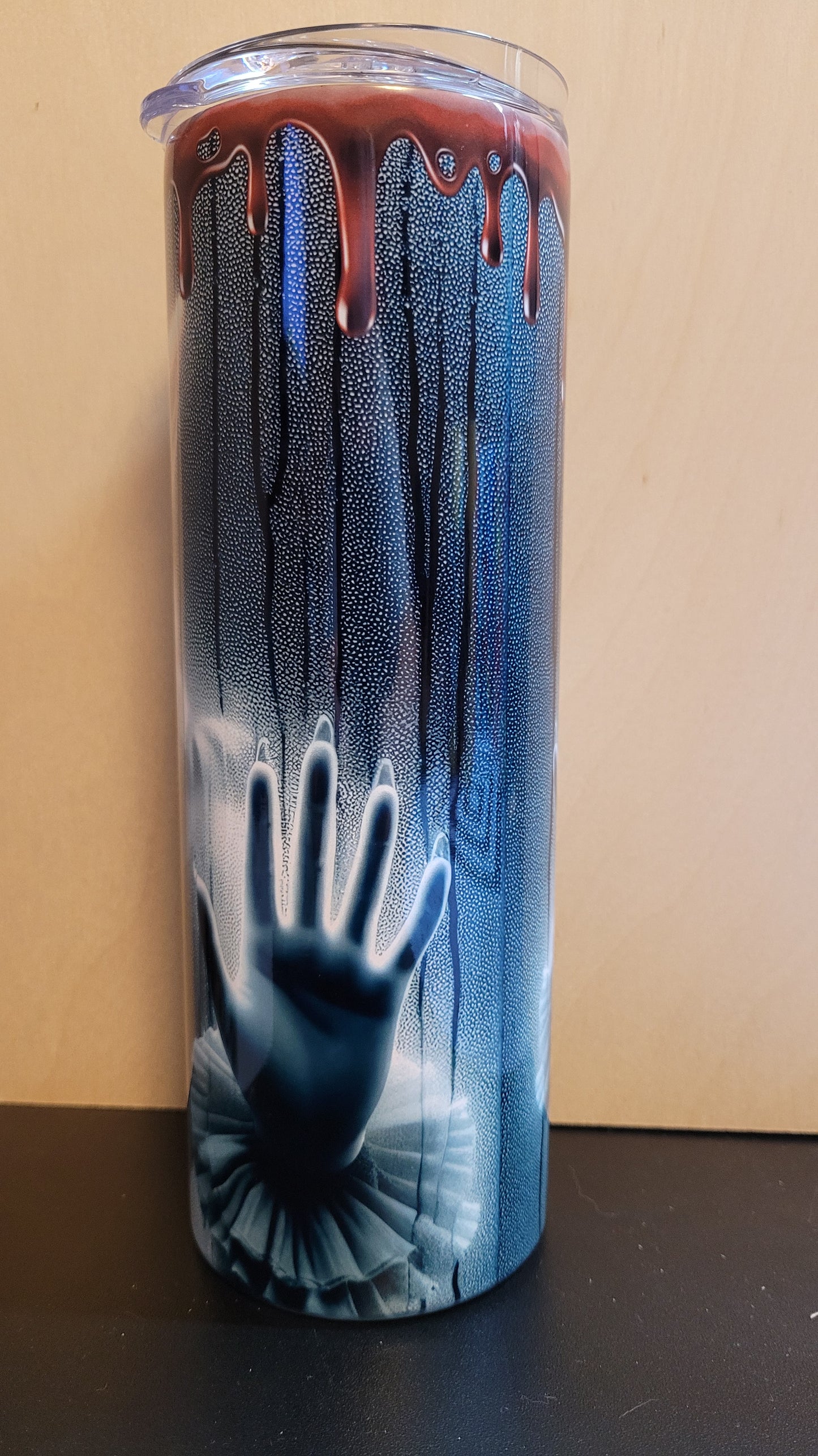 Our horror series sees a new addition.... Pennywise staring at you through a window in the rain....blood dripping down from the top...