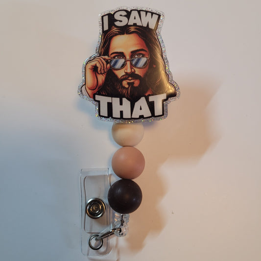 Badge holder with a cartoon character and 'I Saw That' text on a white background