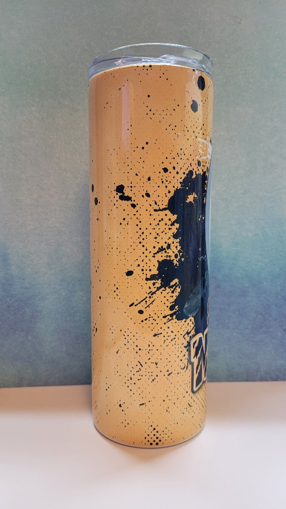 Tall cylindrical container with a speckled design on a gradient background