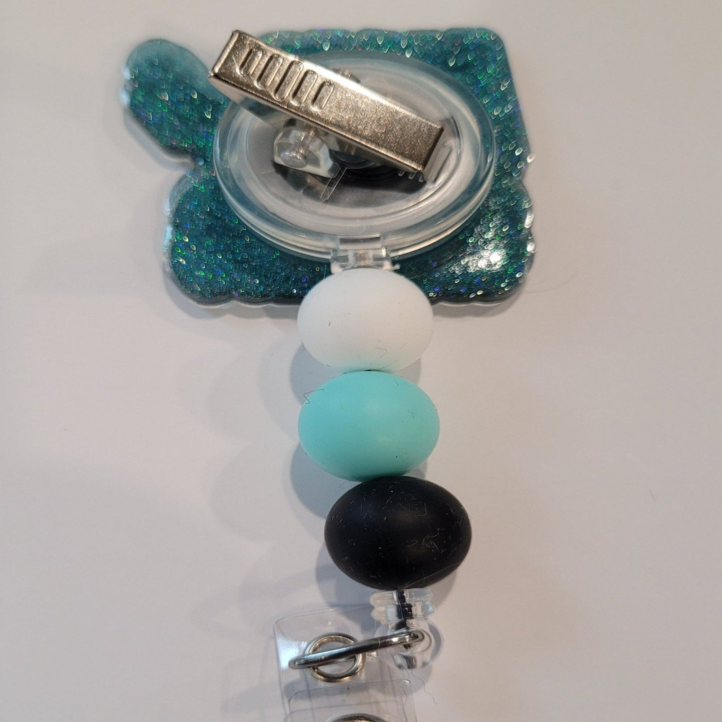 AMA Say Less Those who know...know. Just say less. This new addition to our Medical Field collection is a must have. Light Blue glitter base with color matching beads finish the look.