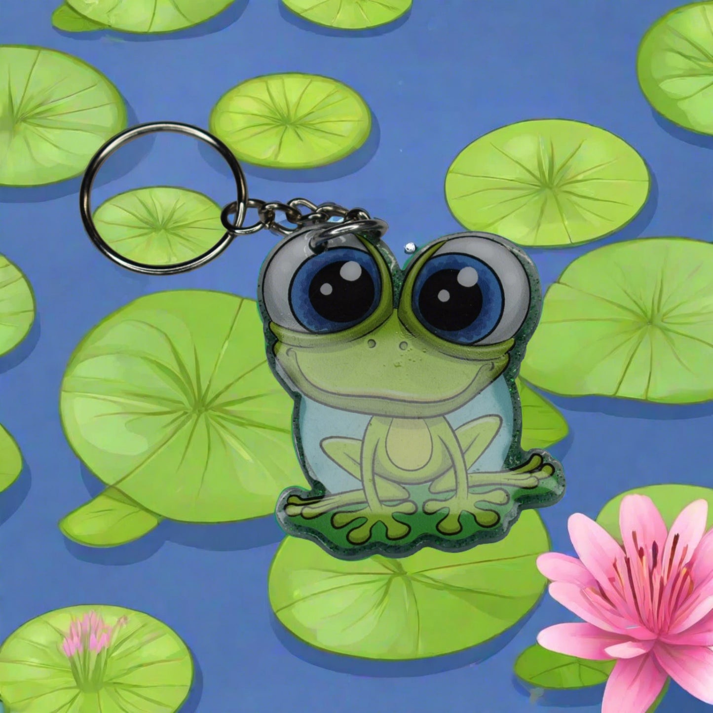 This Frog Keychain is hopping with happiness! Made from durable acrylic resin he comes with a green glitter background and a great happy smile. Available in 2 sizes. Small measures 1.5" x 2" and the large at 2" x 2.5".