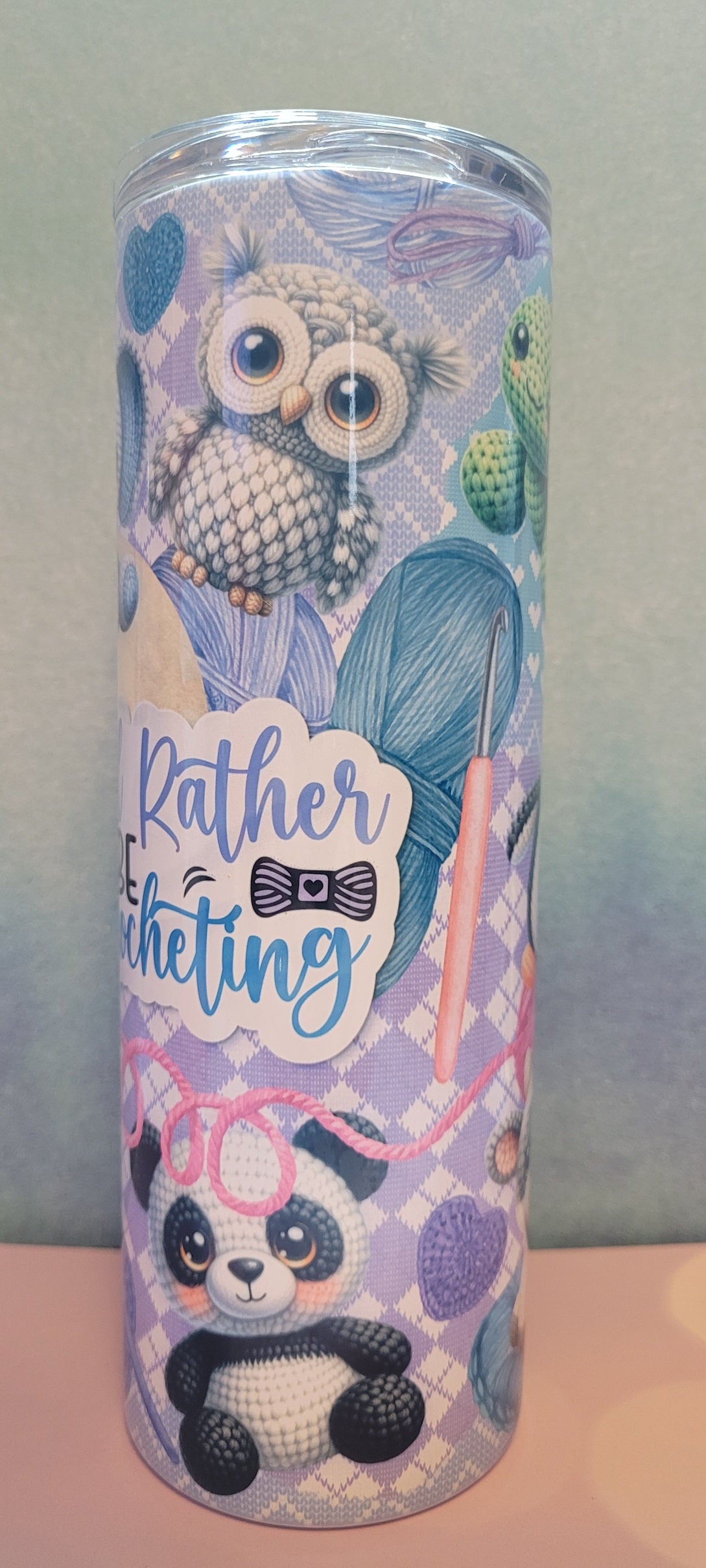 For the crafty people that crotchet. I'd Rather Be Crocheting tumbler. Skeins of yarn and crotched patterns are the background with some adorable crocheted animals filling in the rest of the image.