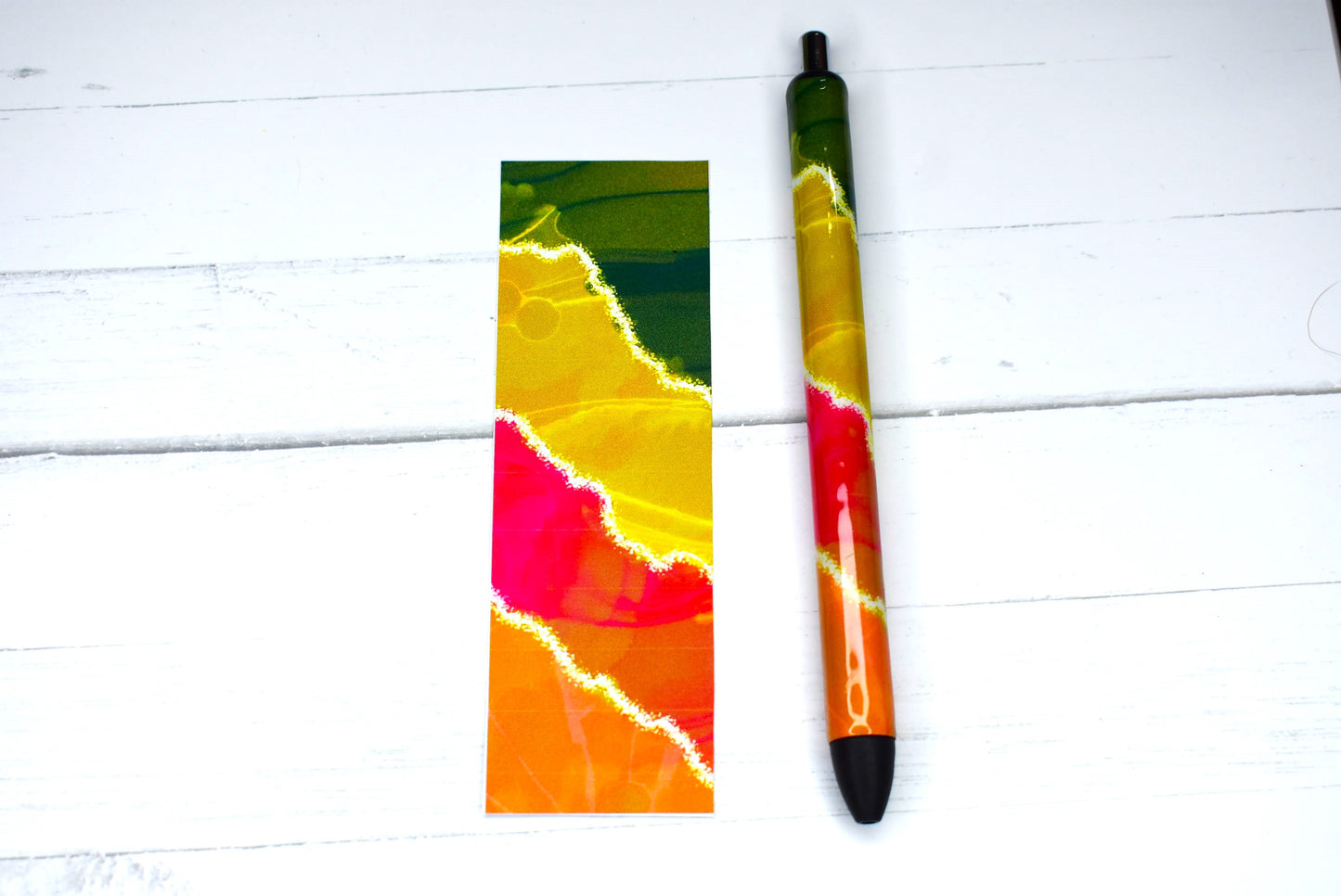 Gel Pen with an epoxy resin coating featuring a Geode dark pattern, black ink, and an extra refill included to ensure long-lasting use.