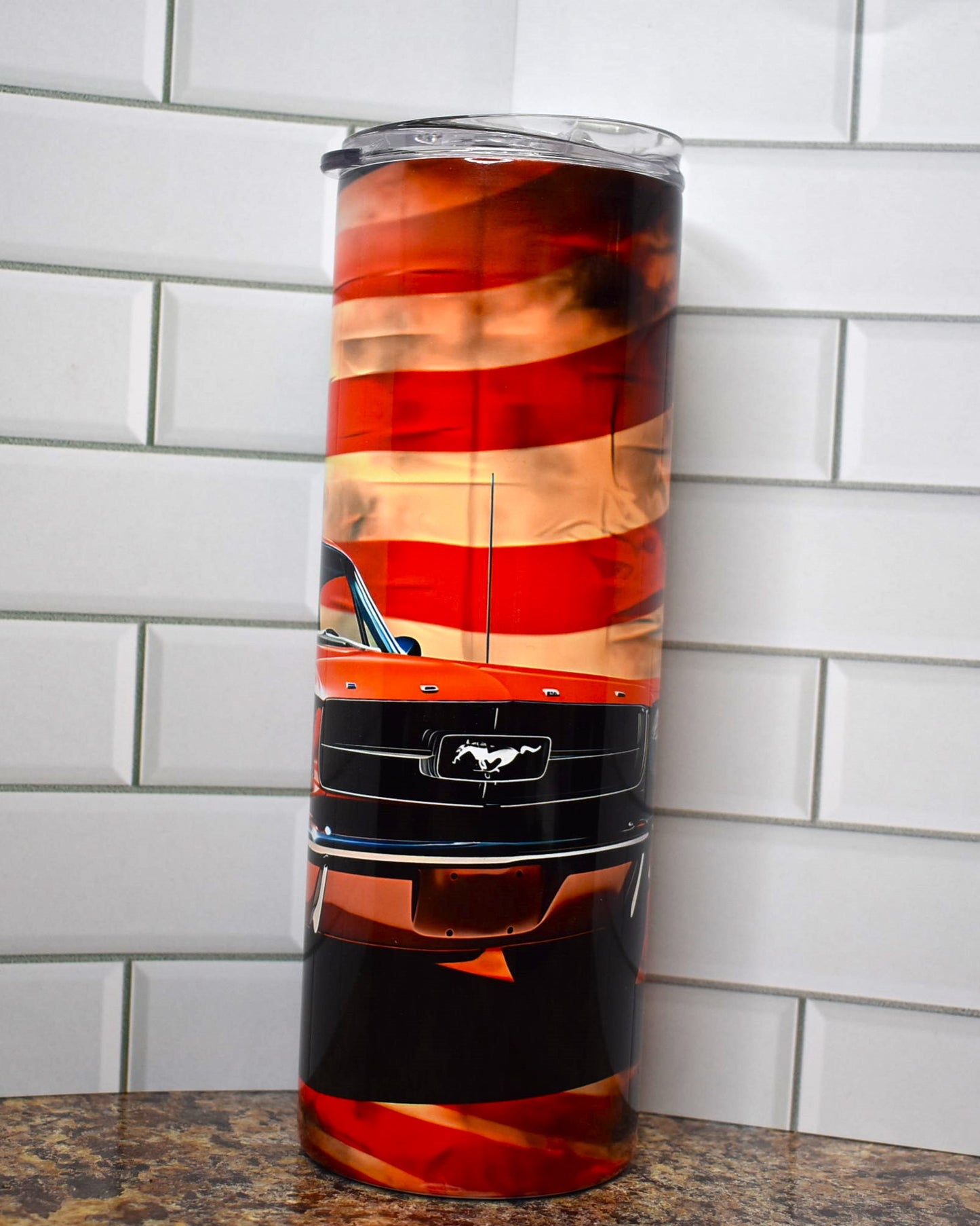 Muscle cars ruled the roads and this tumbler pays homage to the 1966 Ford Mustang in classic red with the American Flag in the background.