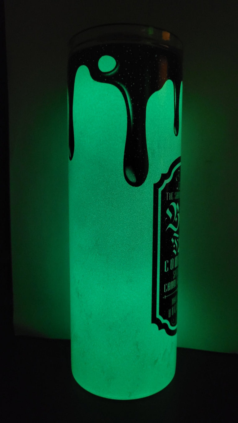 The Black Flame Company established in 1693 and specializing in Candles & Curses. Say What! Features an all black image with the classic drip look. Made with Genuine Hocus Pocus, this tumbler is a sure Halloween favorite. We kicked this one up a notch and put it on our Green Glow in the Dark!