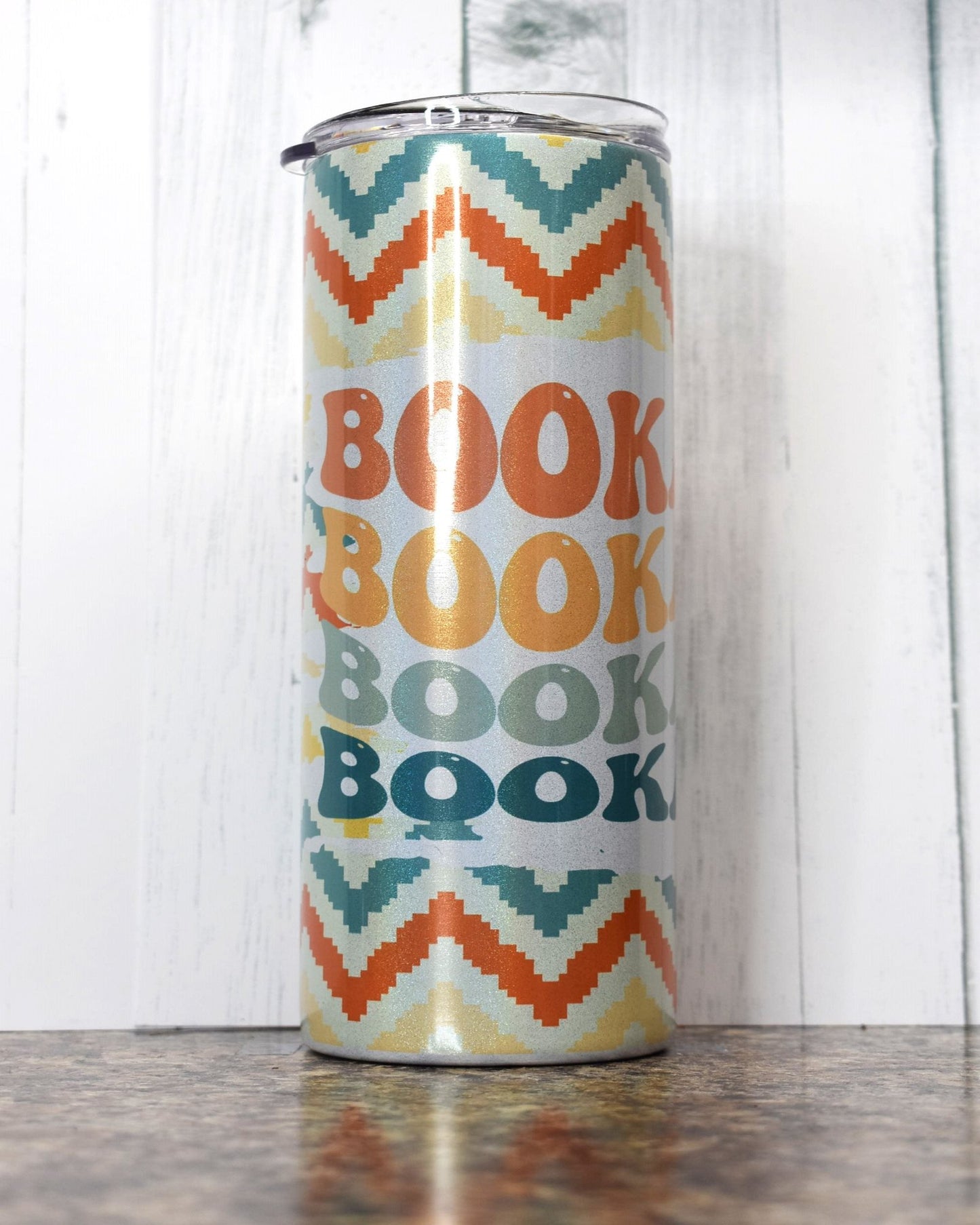 Fill up this 20 oz Stainless Steel Sublimated Bookaholic Tumbler with your favorite drink, grab a book and enjoy the read .