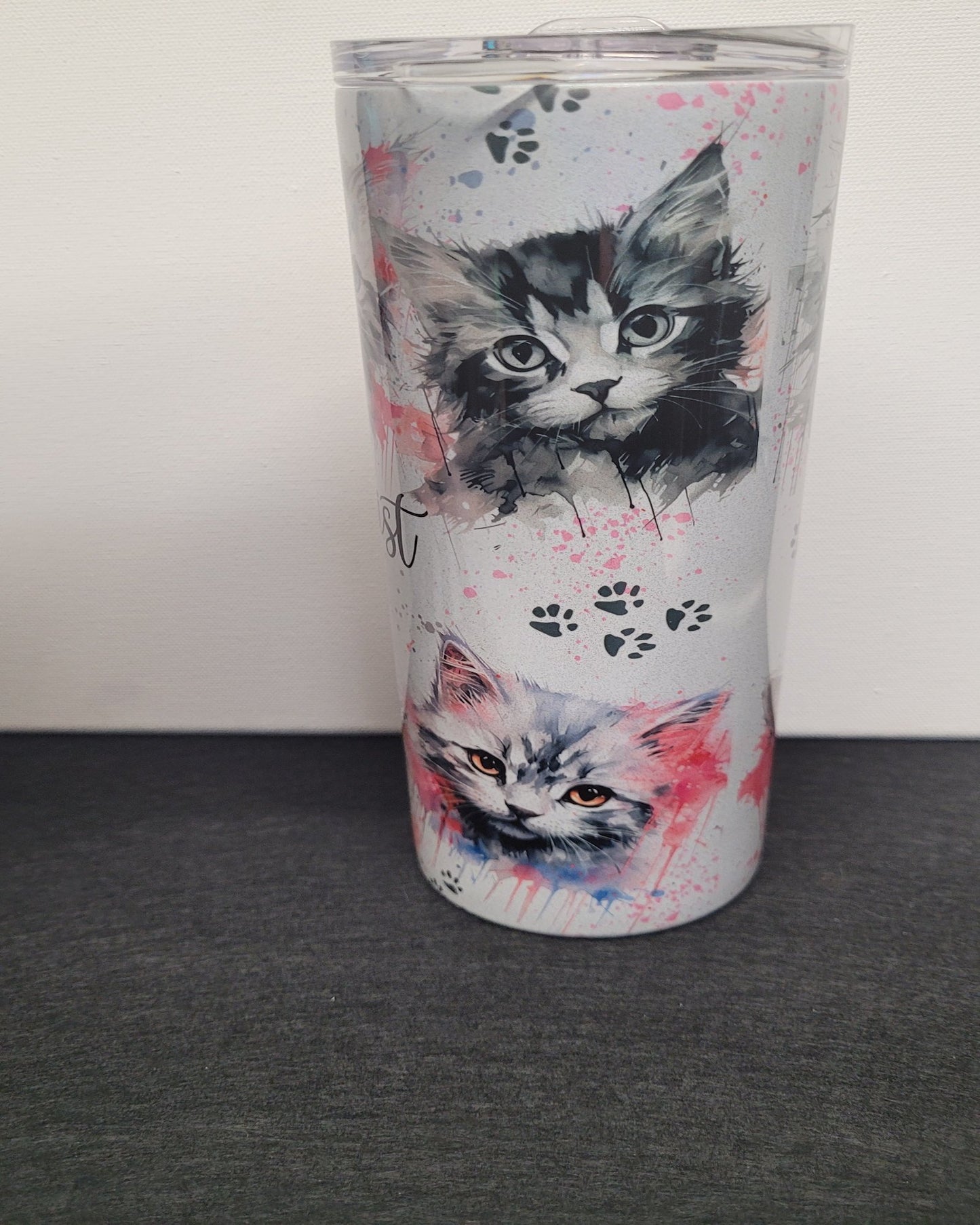 My Therapist Has Fur. This gorgeous tumbler has that phrase with various cute cat pics that will melt your heart and and stress you have. Enjoy your favorite hot or cold beverage on the go and show off your style as you keep your drinks at the perfect temperature.