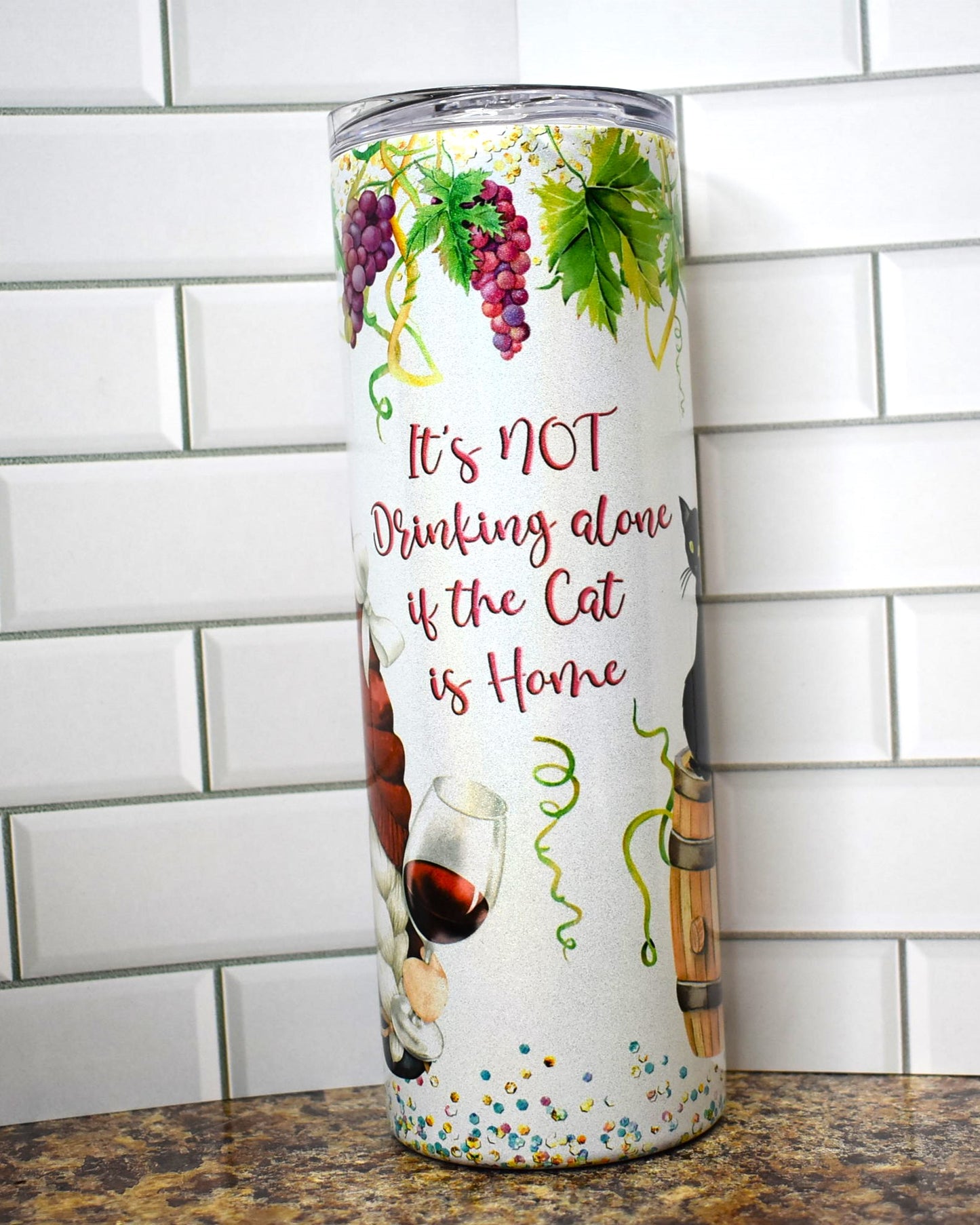 Ever use your cat for an excuse. This cute gnome is enjoying wine with the phrase "It's not drinking alone if the cat is home"