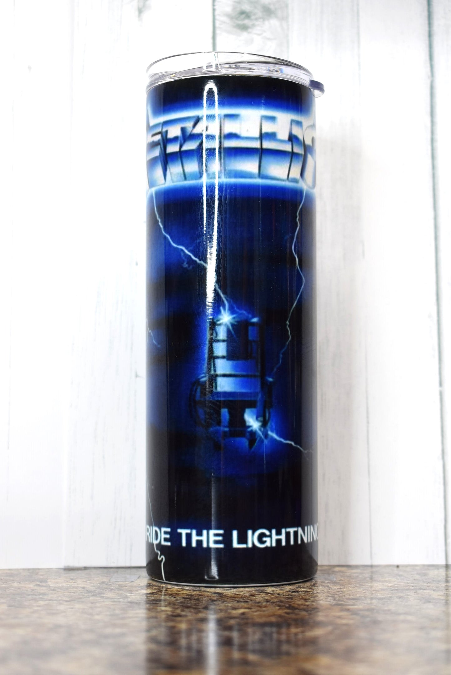 Get a charge out of This 20 oz Makerflo Stainless Steel tumbler that features the Metallica Ride the Lightning Album Cover.