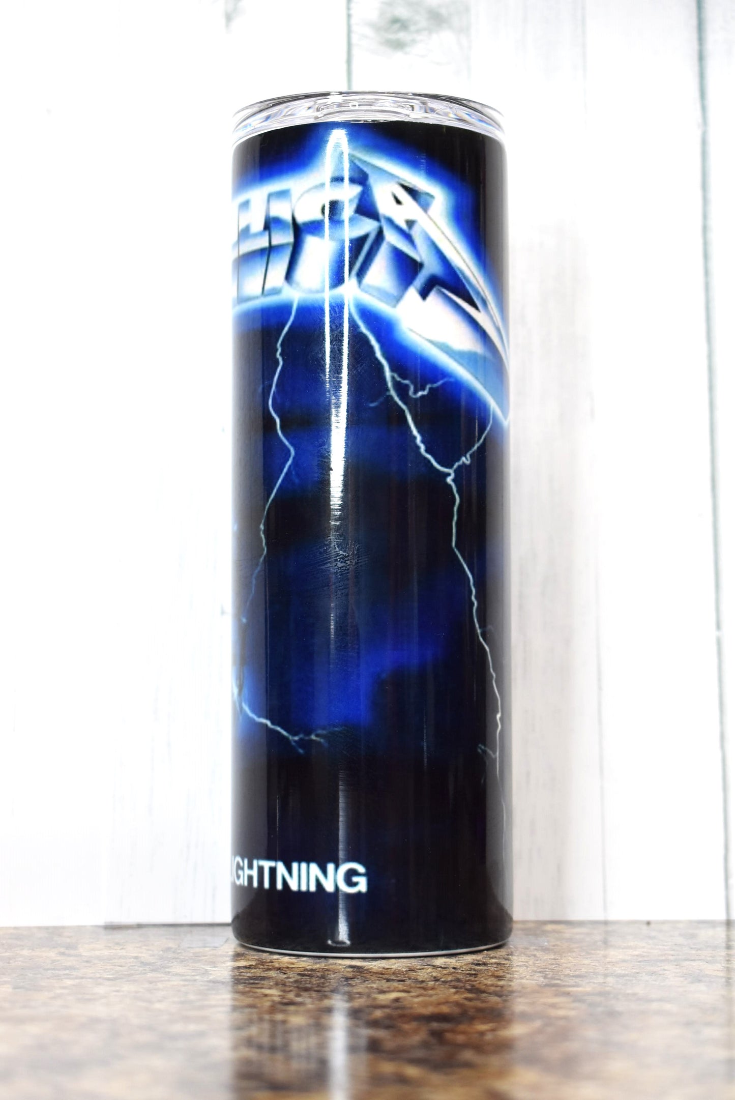 Get a charge out of This 20 oz Makerflo Stainless Steel tumbler that features the Metallica Ride the Lightning Album Cover.