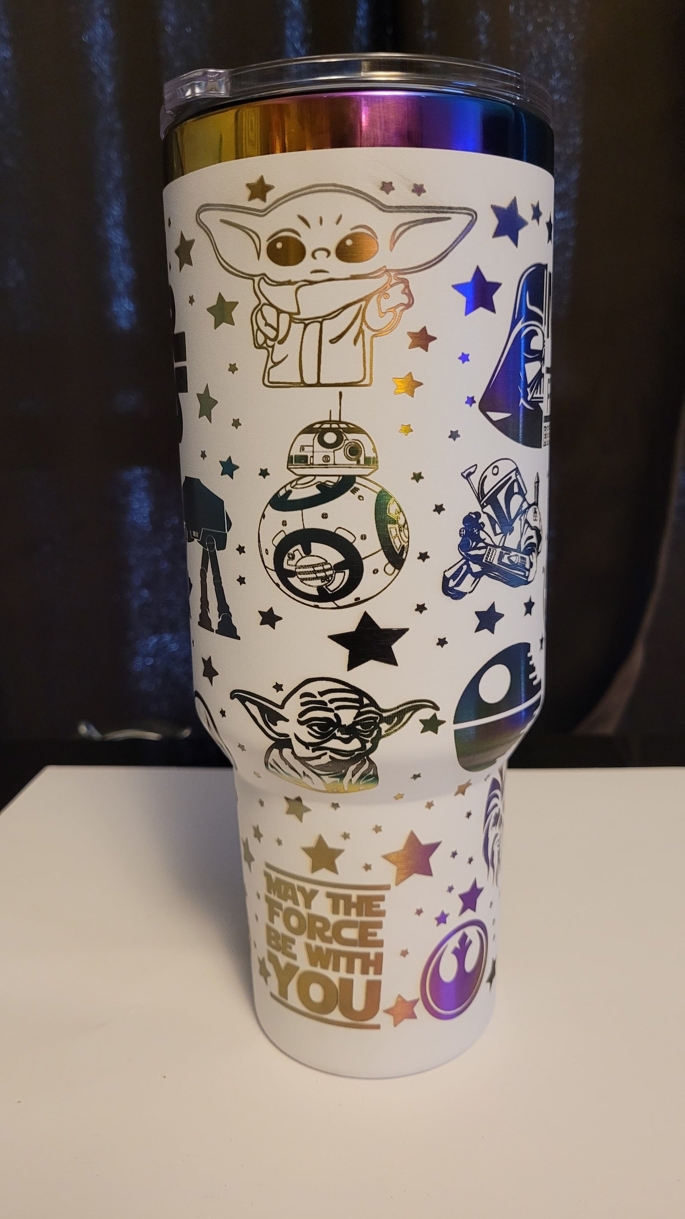Star wars on a white 40 oz with gold plating.