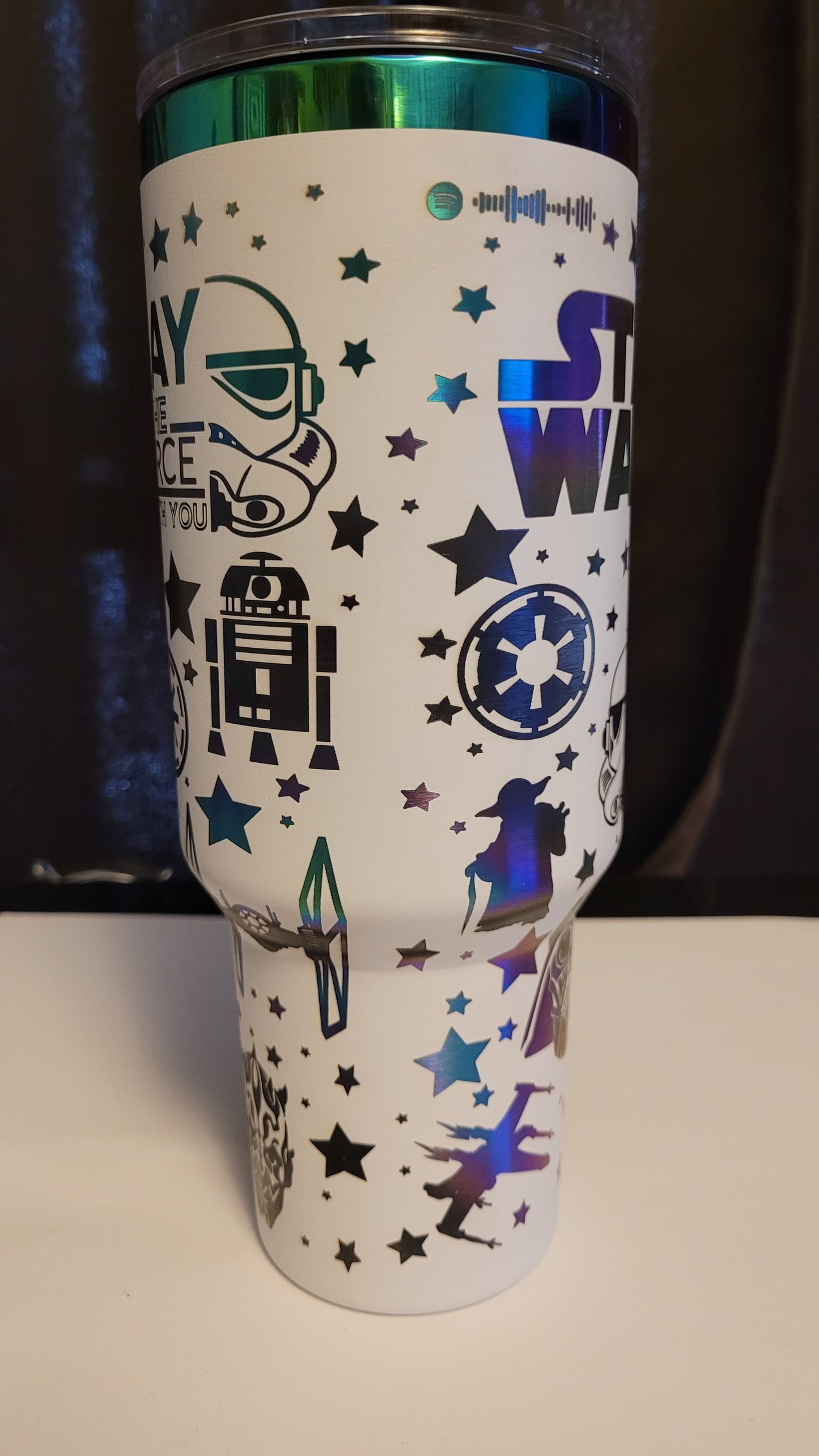 Star wars on a white 40 oz with gold plating.