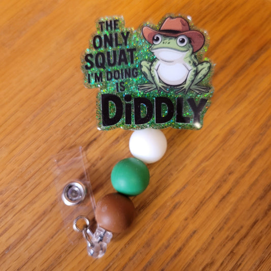 Another new one to our Animal Series... Frog Diddly. The Only Squat I'm Doing Is Diddly is on the front with this cool cowboy hat wearing frog sitting and doing Diddly Squat!