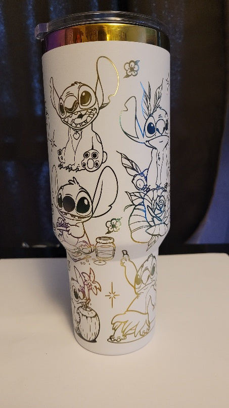 Introducing the latest addition to our collection: the 40 oz Gold Plated Tumbler featuring laser-etched full-wrap from another on a sleek white background.