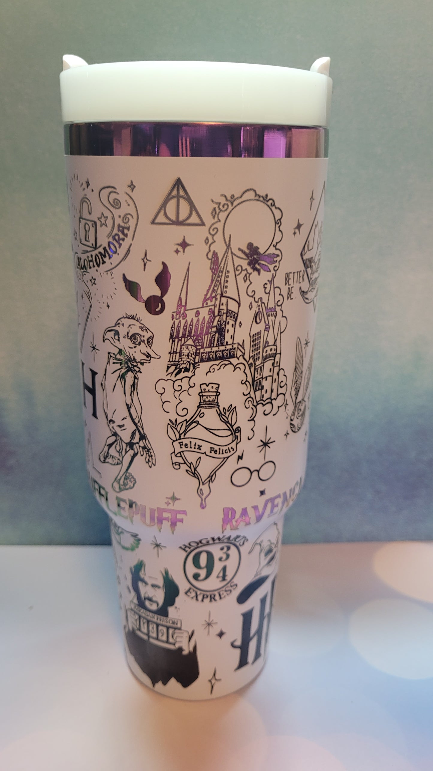 Cylindrical product with decorative design on a light blue background