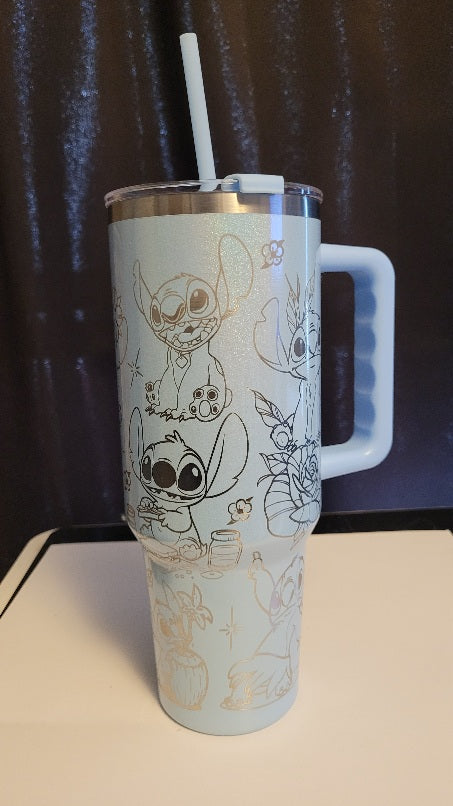 Tumbler with cartoon character design on a dark background