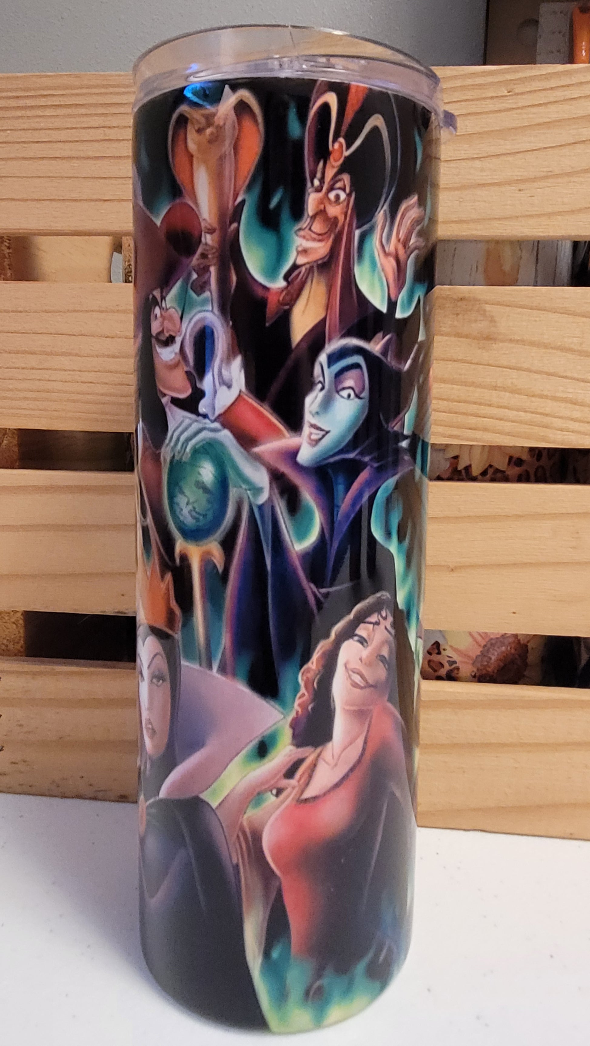 Disney Villains! This tumbler shows the worst of the worst! In a&nbsp; 20 oz tumbler from Makerflo it is made of a stainless steel double-wall construction and is vacuum insulated, with a clear sliding classic lid and a clear straw, and is BPA free. It is capable of retaining cold temperatures for 24+ hours or warm temperatures for up to 8 hours.