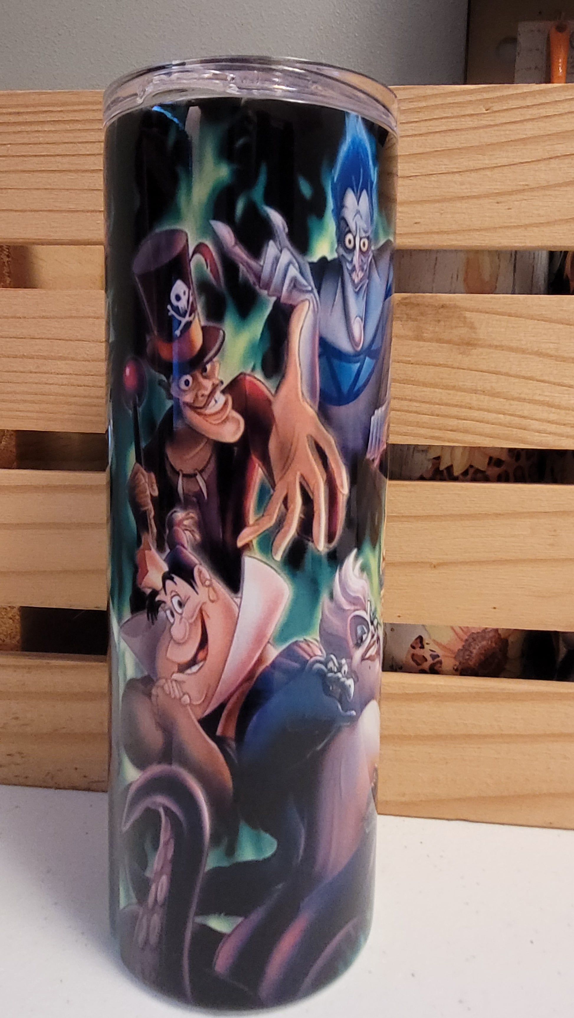 Disney Villains! This tumbler shows the worst of the worst! In a&nbsp; 20 oz tumbler from Makerflo it is made of a stainless steel double-wall construction and is vacuum insulated, with a clear sliding classic lid and a clear straw, and is BPA free. It is capable of retaining cold temperatures for 24+ hours or warm temperatures for up to 8 hours.