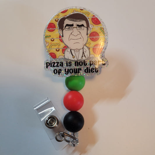 Badge holder with cartoon character and text 'Pizza is not part of your diet' on a yellow background.