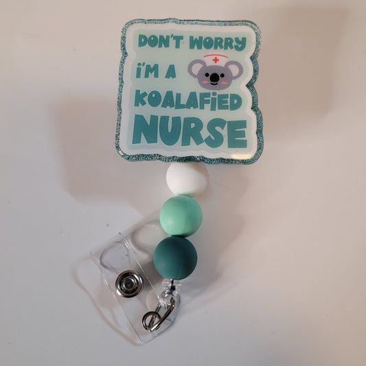 Badge holder with 'Don't worry, I'm a koalafied nurse' text and koala illustration on a white background