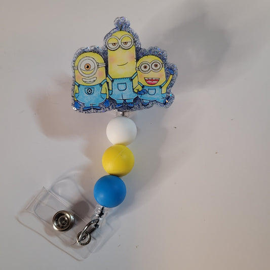 Badge holder with cartoon character design on a white background