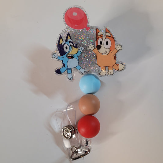 Badge holder with cartoon characters and colorful beads on a white background