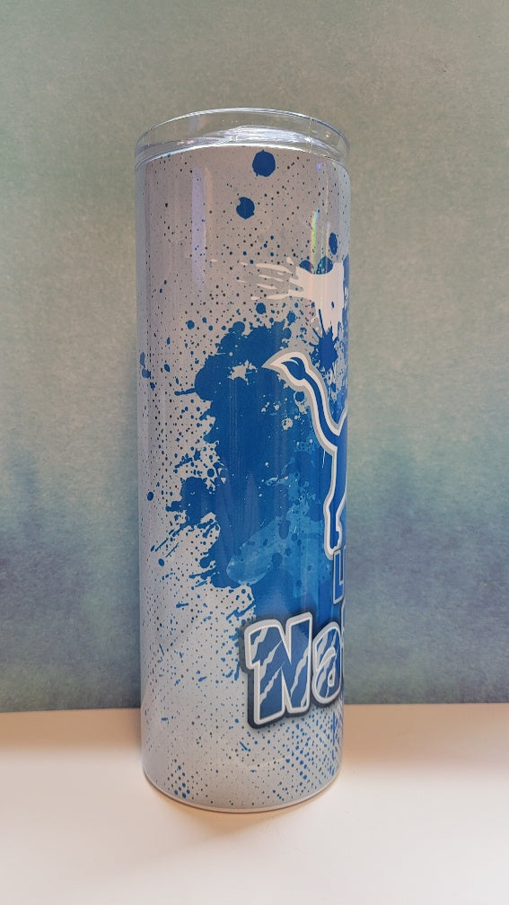 Cylindrical can with blue splatter design and 'No' branding on a gradient background