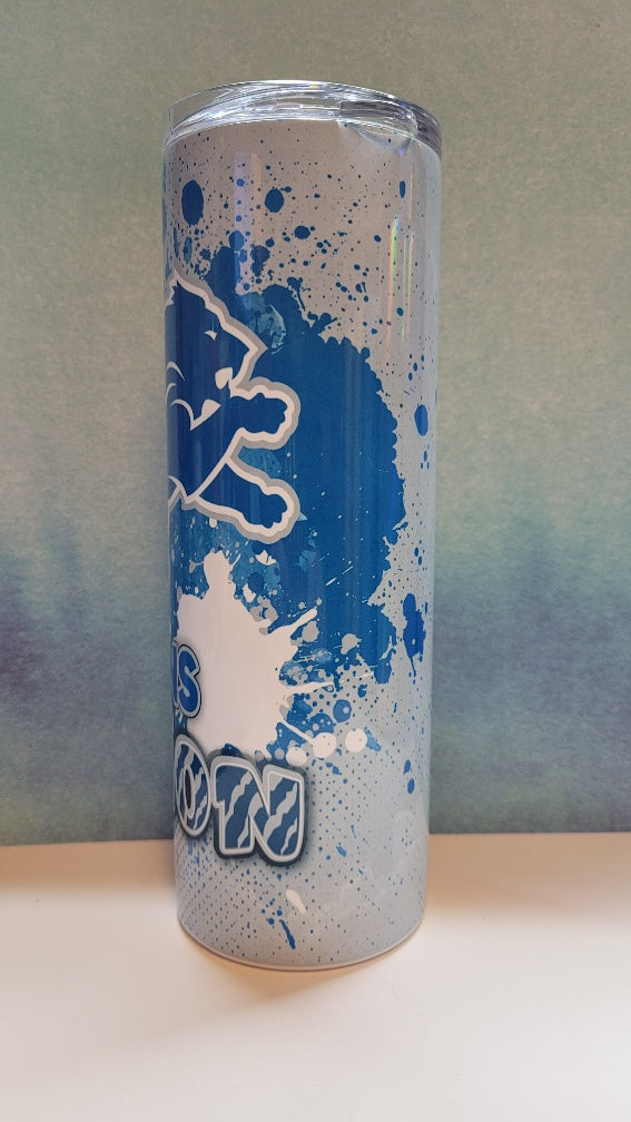 Blue and white energy drink can on a gray background