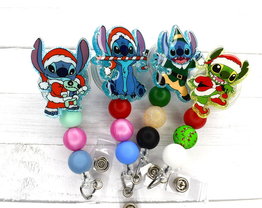 This badge reel features Experiment 626 enjoying Christmas. 4 different versions available. All badge reels feature a glitter base and color coordinated beads.