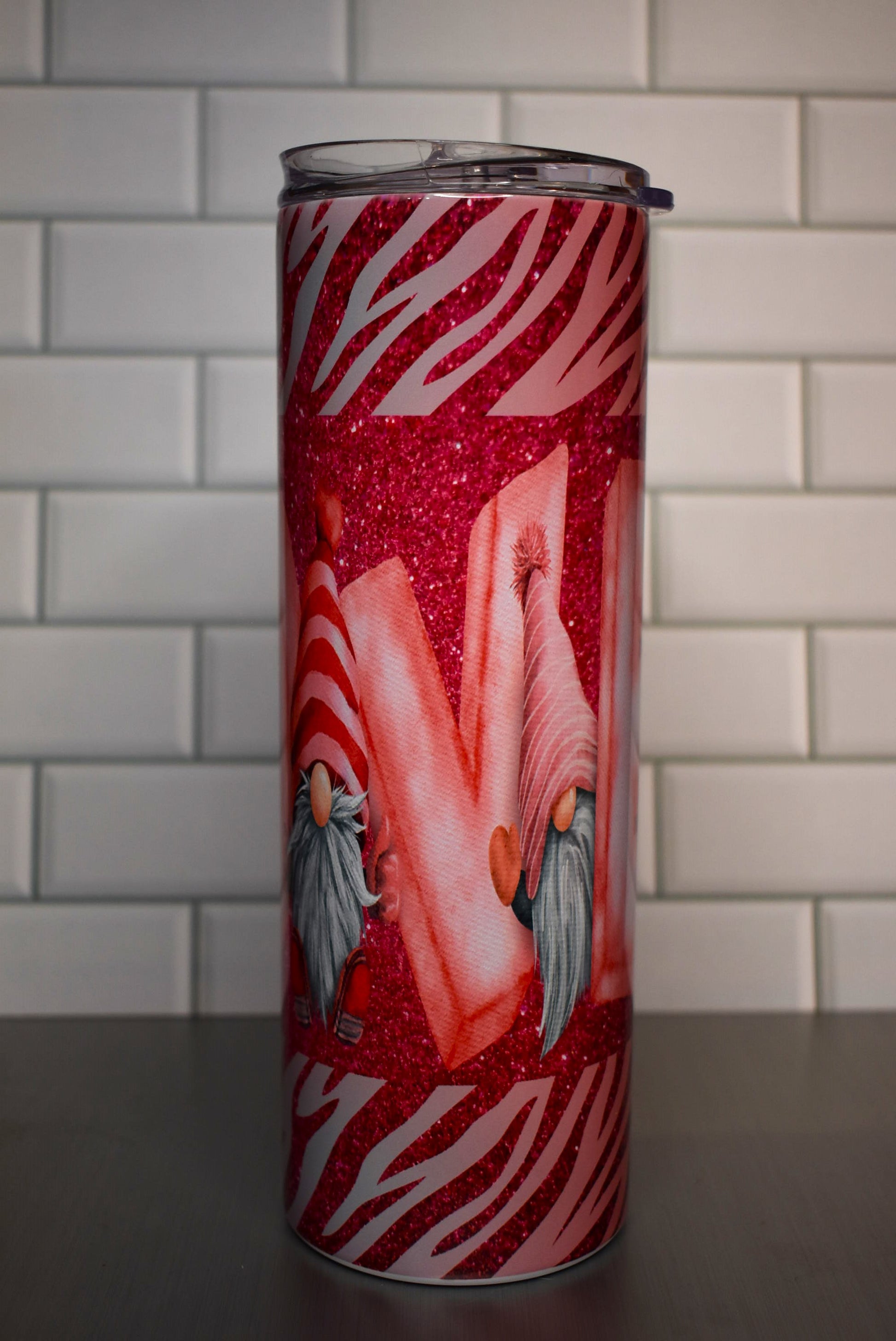 Love is in the air and has pretty glitter as well. This Valentines Gnome Love Tumbler is a eye catcher and heart stealer.