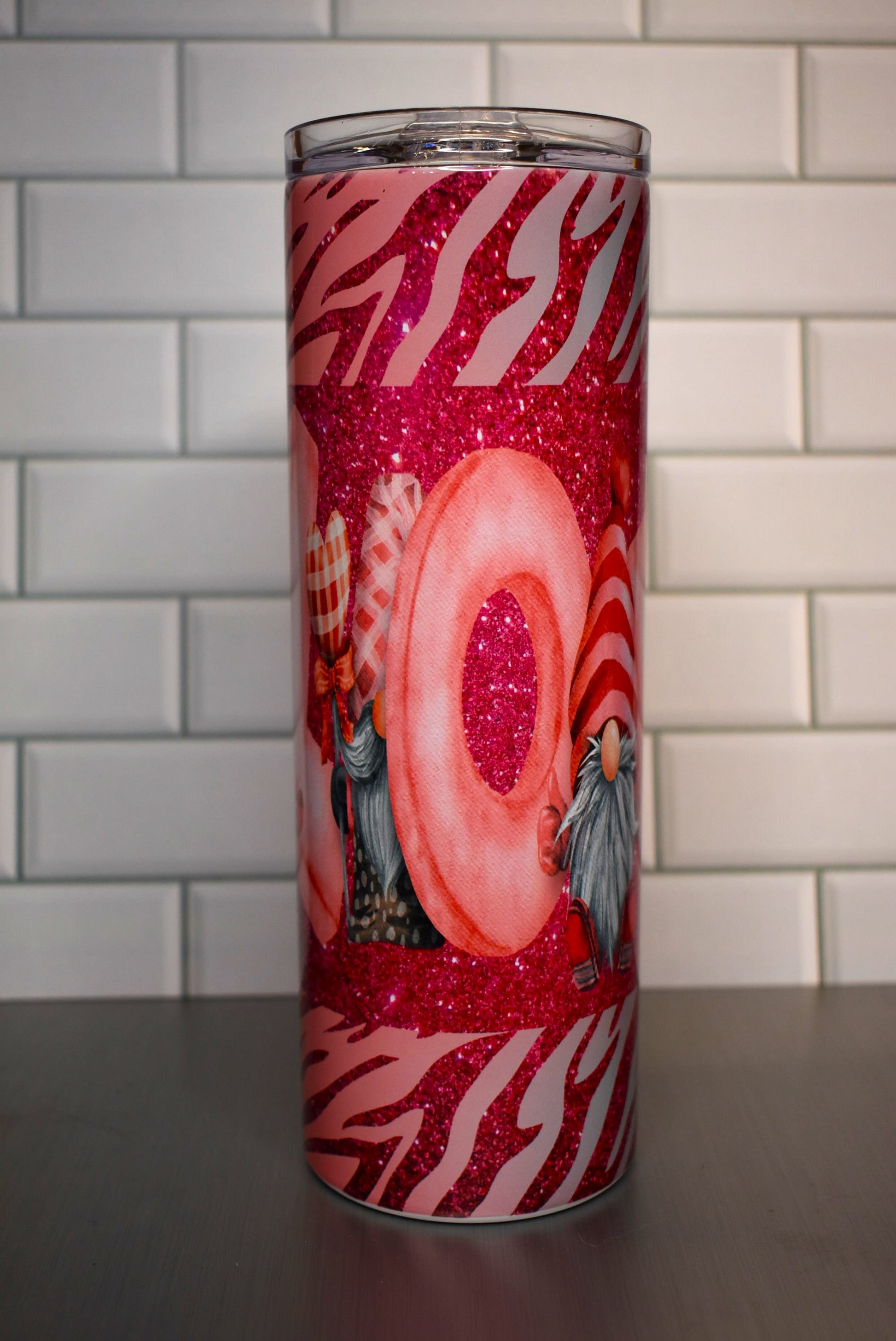 Love is in the air and has pretty glitter as well. This Valentines Gnome Love Tumbler is a eye catcher and heart stealer.