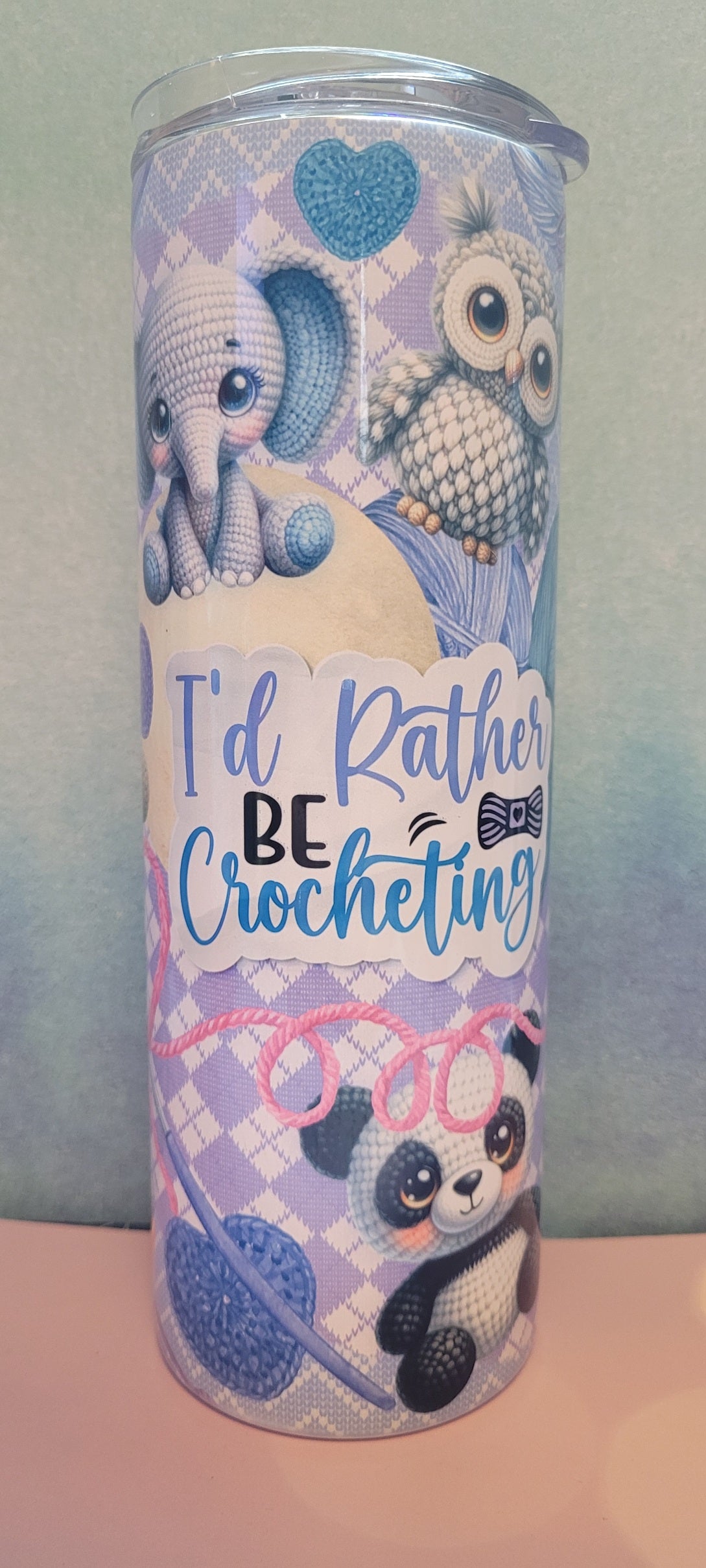 For the crafty people that crotchet. I'd Rather Be Crocheting tumbler. Skeins of yarn and crotched patterns are the background with some adorable crocheted animals filling in the rest of the image.