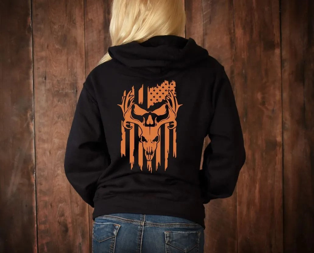 This T-Shirt features a deer buck skull, punisher skull eyes, and the American Flag printed on a 5.3 oz. pre-shrunk 100% cotton fabric, with a bright orange hue that stands out.