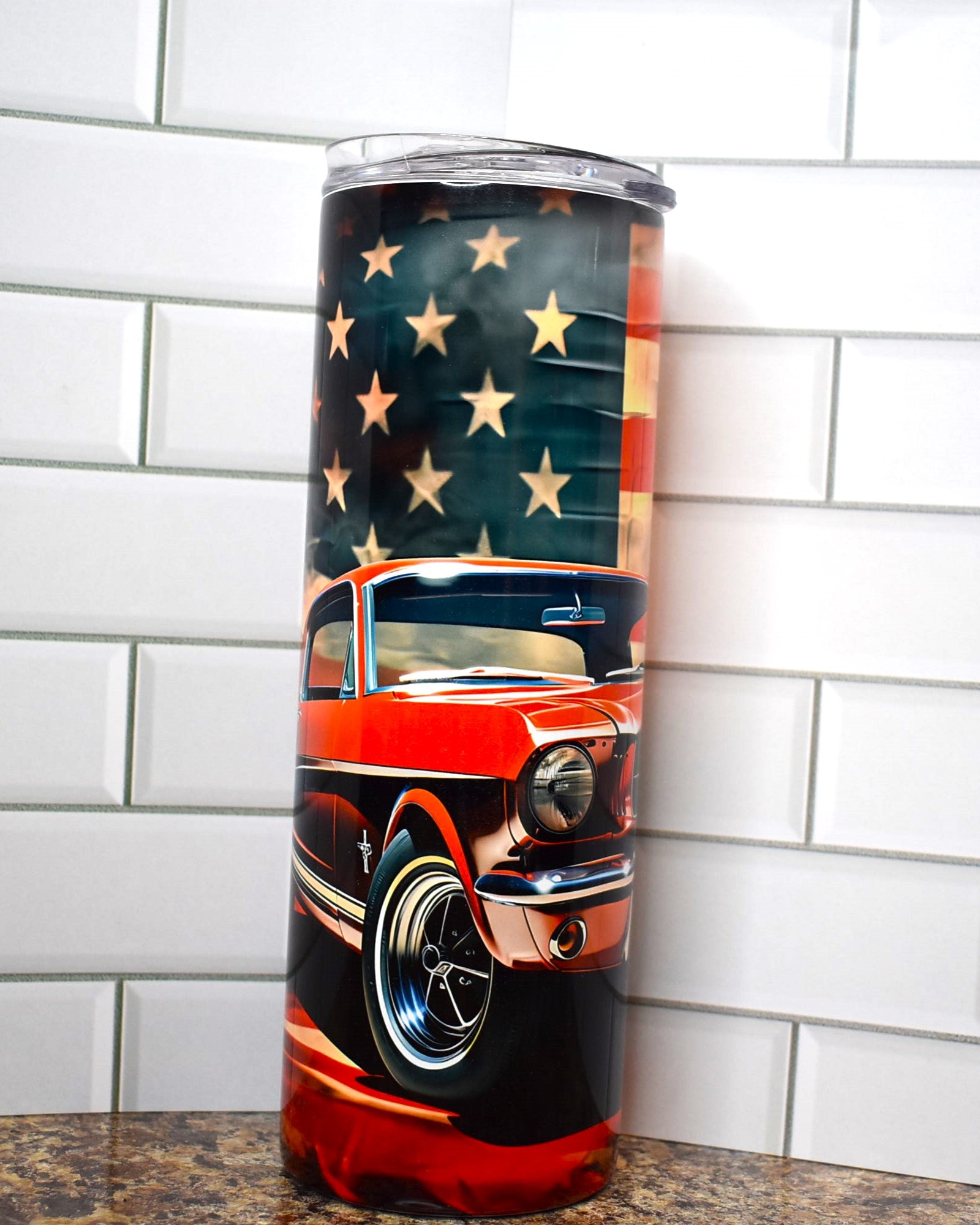 Muscle cars ruled the roads and this tumbler pays homage to the 1966 Ford Mustang in classic red with the American Flag in the background. 