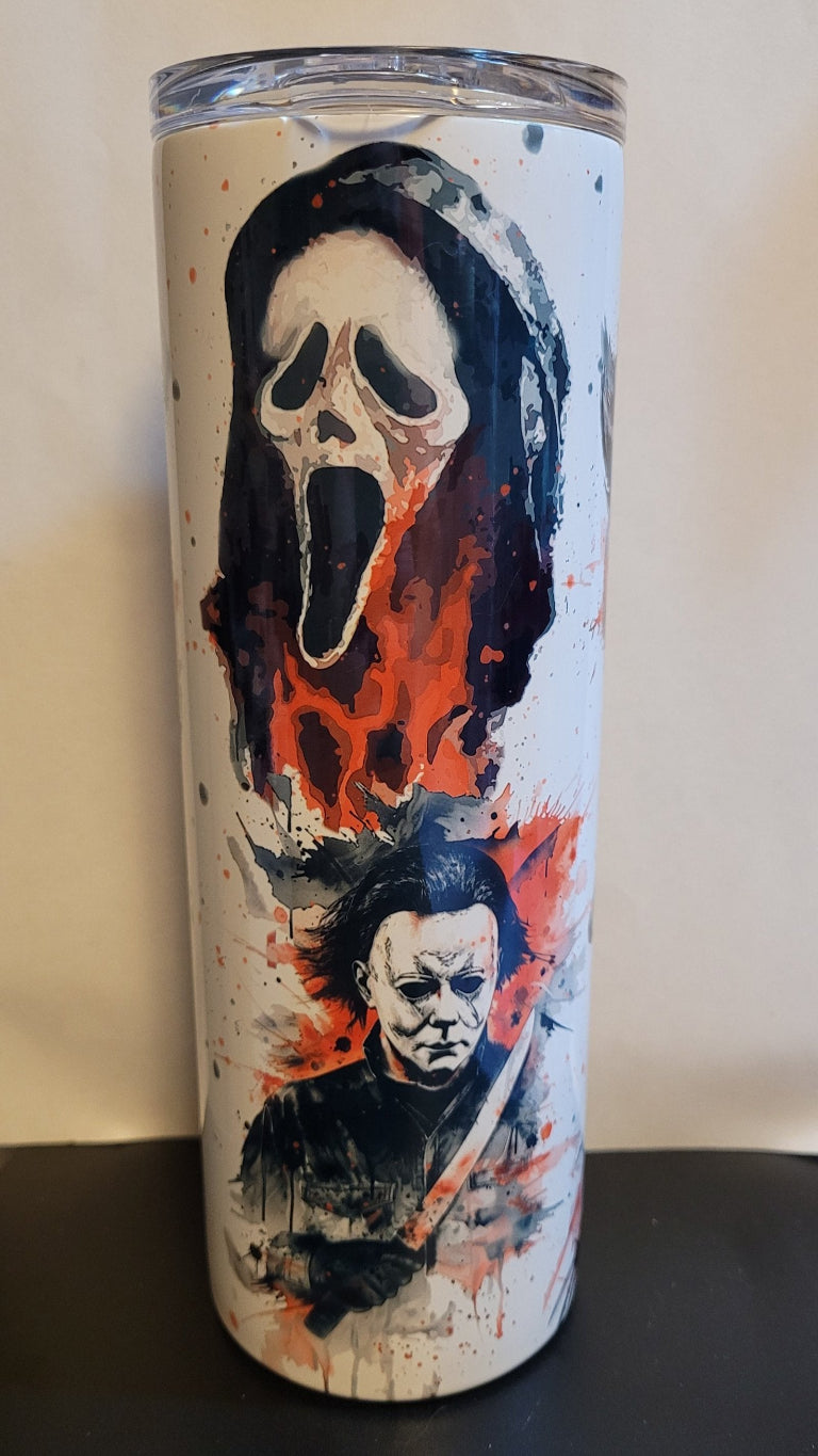 We like to call this one...Boys of Horror. Not 1, 2 but a 6 pack of the scariest horror movie characters out there. Freddie, Michael Myers and Pennywise, Chucky, Jason Michael and we can't for Ghostface. An all-star collage on this 20 oz tumbler. Made of a stainless steel double-wall material and has a vacuum insulated feature, with a clear sliding classic lid and a clear straw, and is BPA free. It is capable of retaining cold temperatures for 24+ hours or warm temperatures for up to 8 hours.