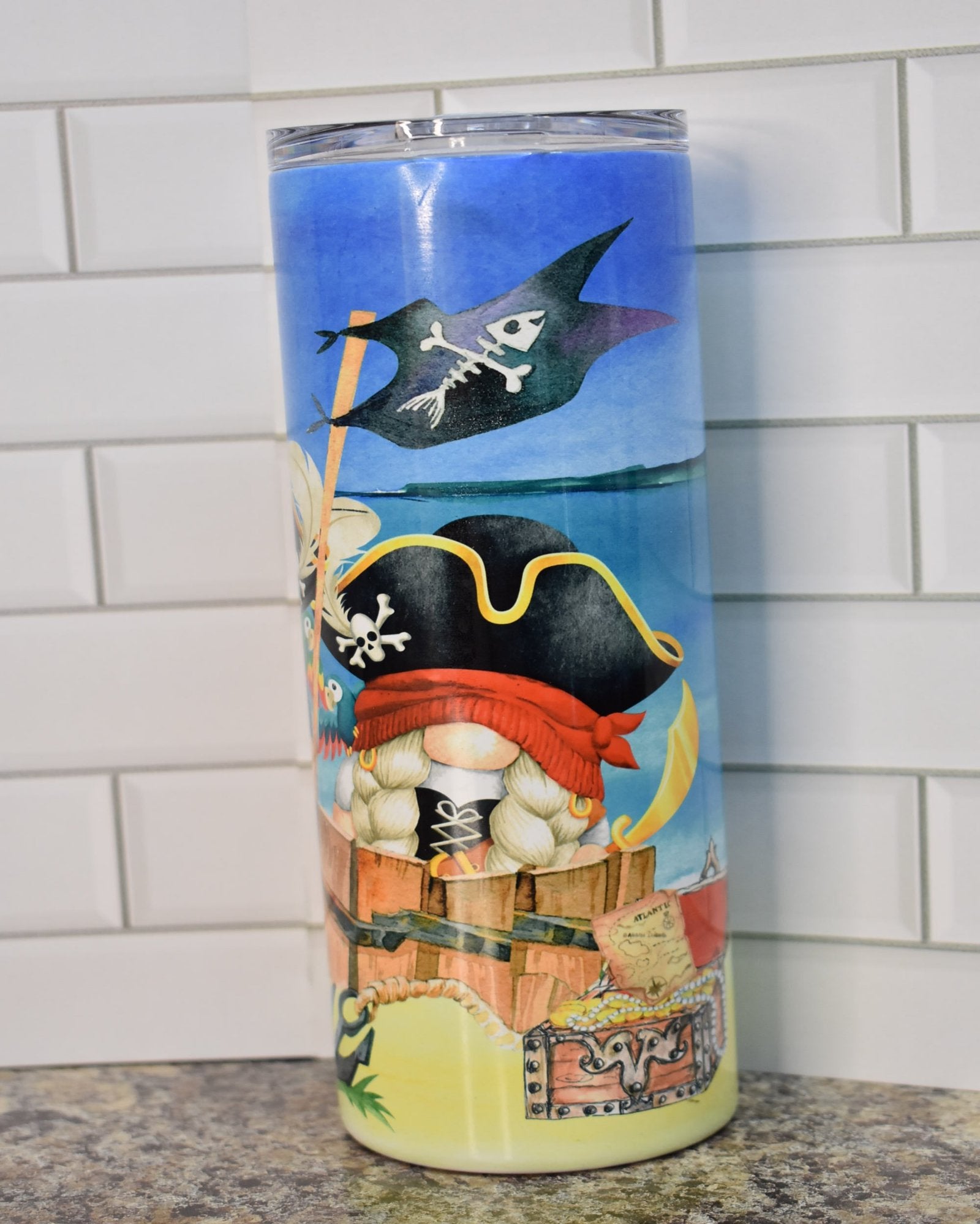 Get ready to walk the plank with these 2 cute Gnome Pirates who washed up on shore in the Caribbean to bury their treasure. This is on our 20 oz Makerflo Stainless Steel Tumbler, sure to keep the cold drinks cold or your coffee piping hot.