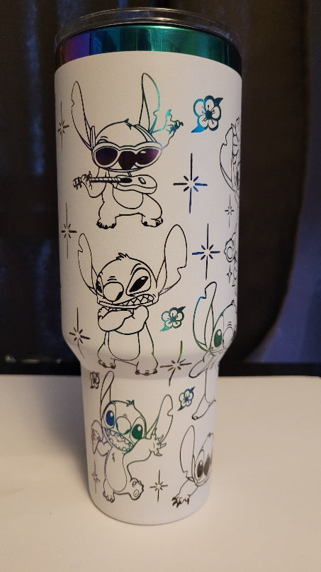 Introducing the latest addition to our collection: the 40 oz Gold Plated Tumbler featuring laser-etched full-wrap from another on a sleek white background.