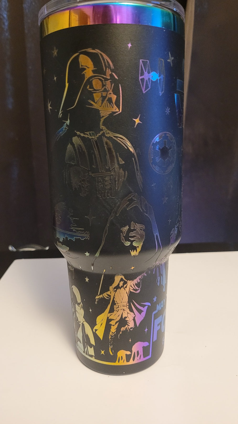 Tumbler with Star Wars-themed design featuring characters and elements.