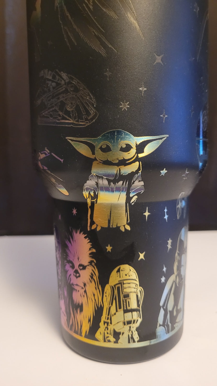 Star Wars-themed tumbler with character illustrations on a dark background