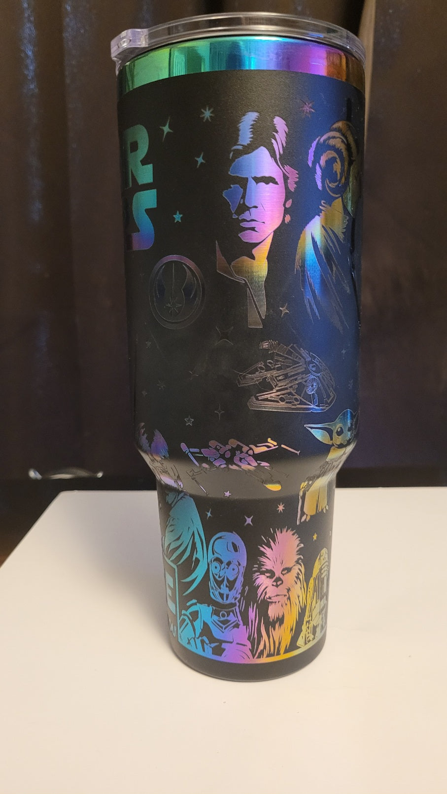 Tumbler with Star Wars-themed design featuring characters and logos.