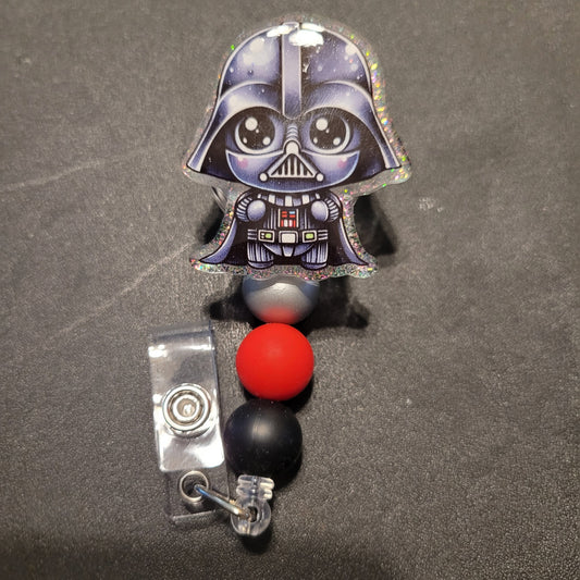 Badge holder with Darth Vader design on a dark background