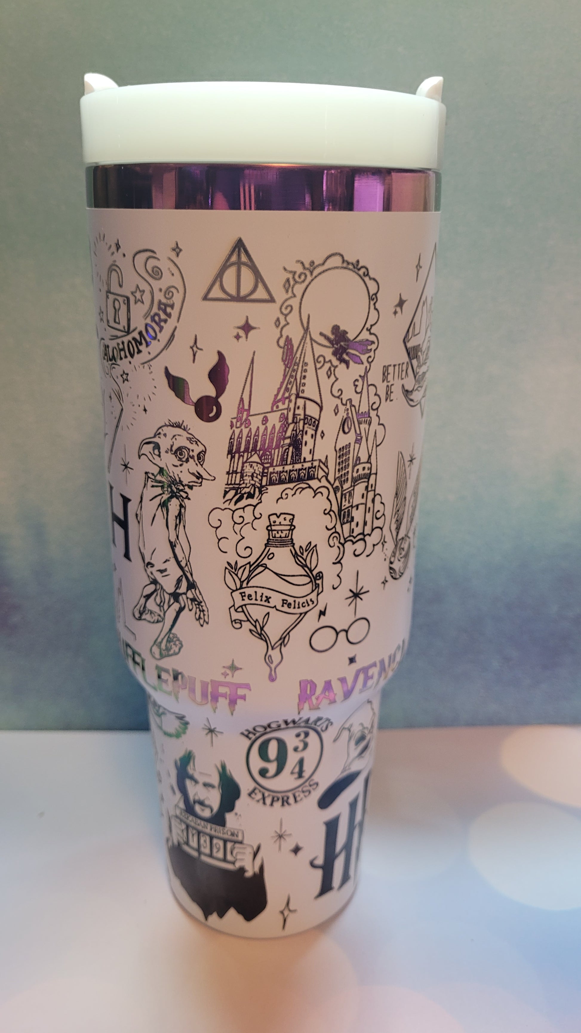 Cylindrical product with decorative design on a light blue background